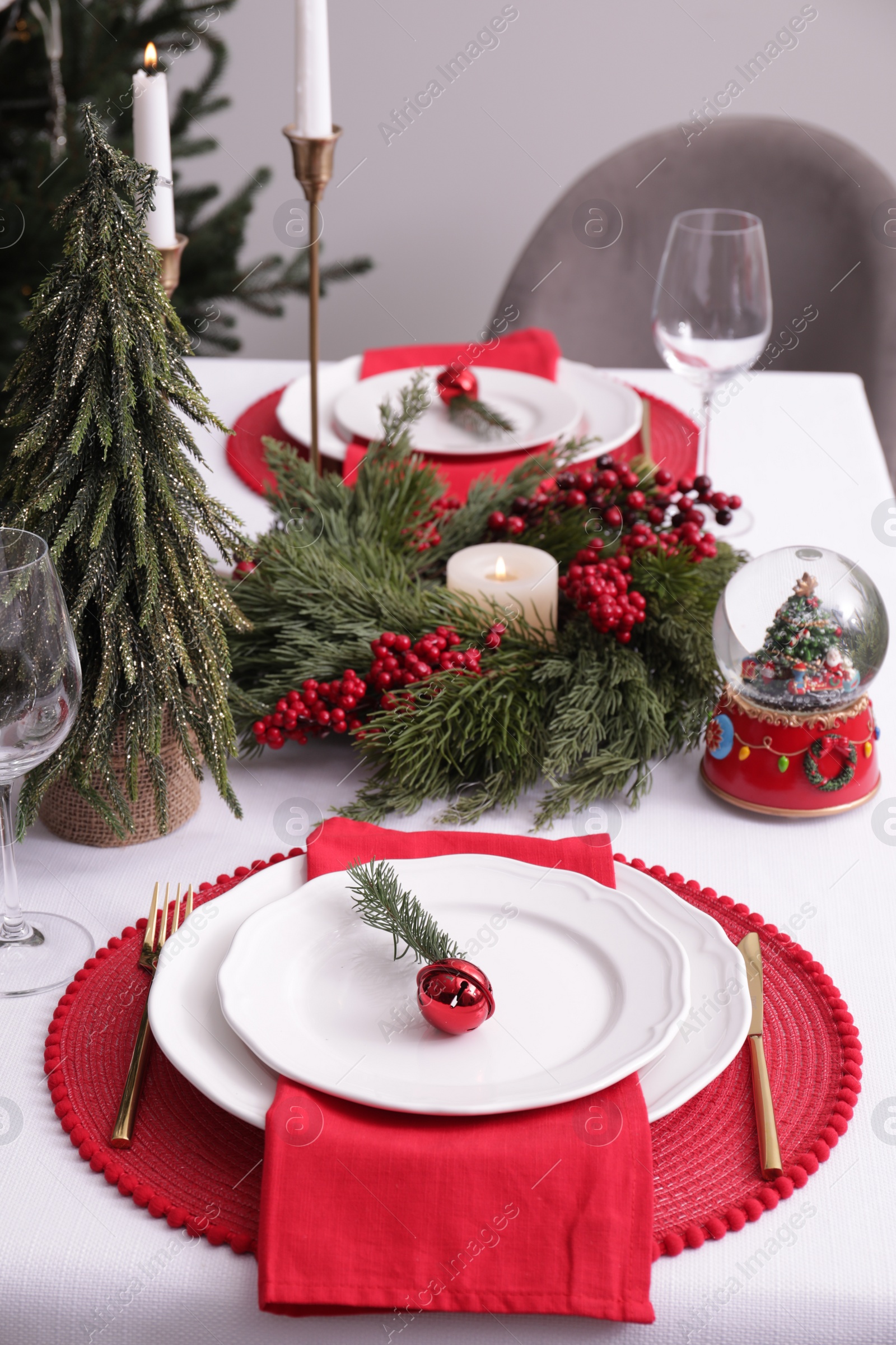 Photo of Luxury place setting with beautiful festive decor for Christmas dinner on white table