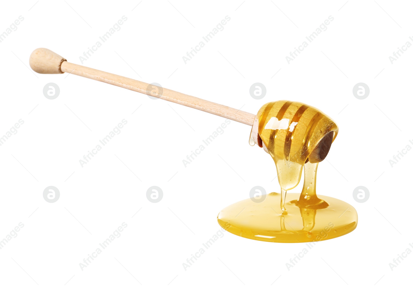 Photo of Natural honey dripping from dipper on white background