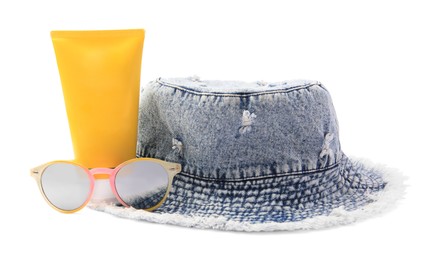 Photo of Denim hat, sunscreen and stylish sunglasses isolated on white. Beach objects