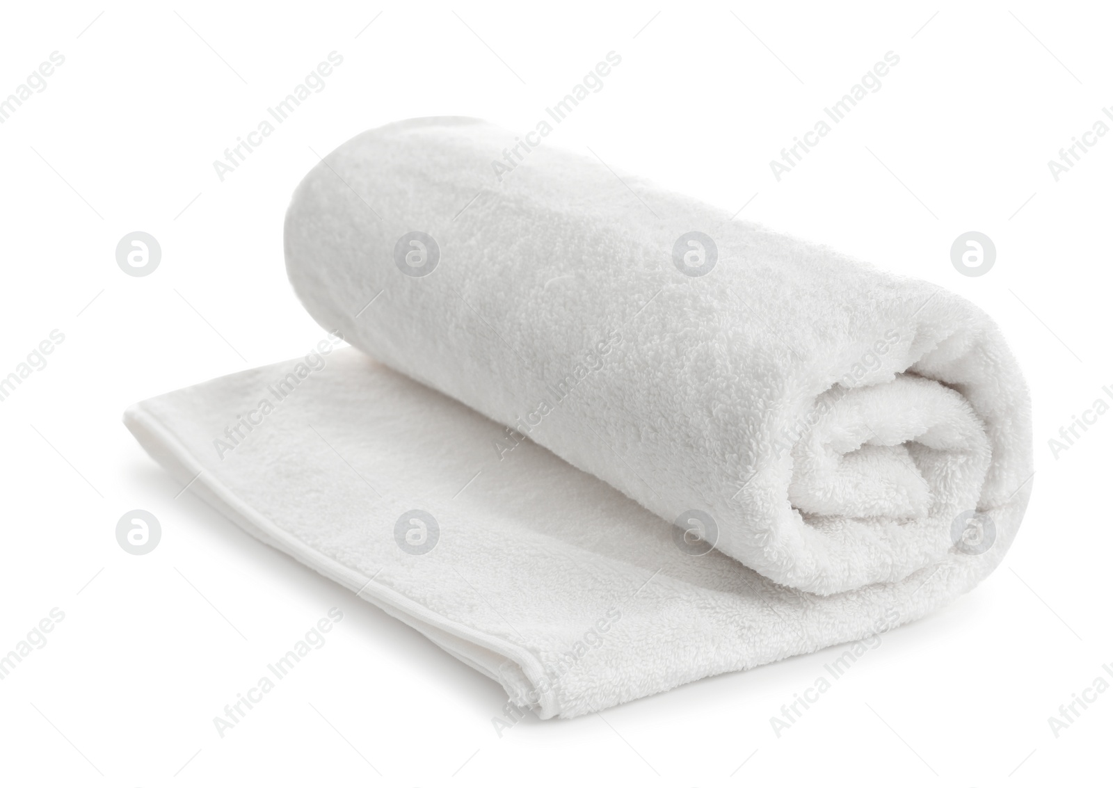 Photo of Rolled soft terry towel on white background