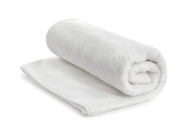 Rolled soft terry towel on white background