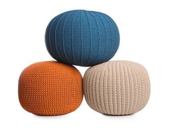 Different stylish poufs on white background. Home design