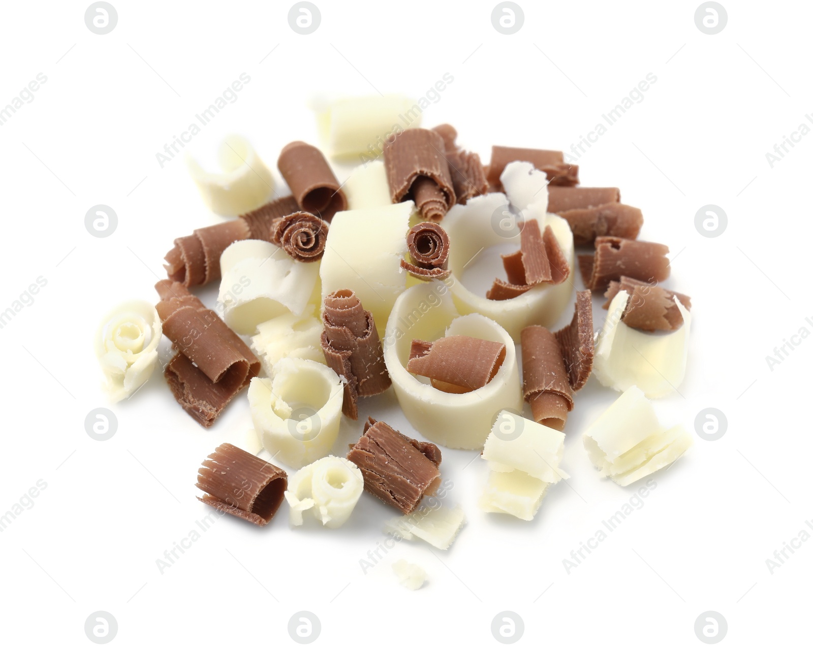 Photo of Pile of different tasty chocolate shavings isolated on white