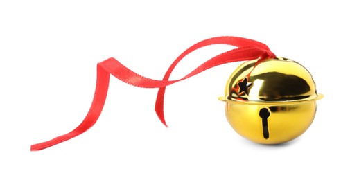 Photo of Shiny golden sleigh bell with ribbon isolated on white