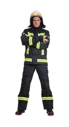 Photo of Full length portrait of firefighter in uniform and helmet on white background
