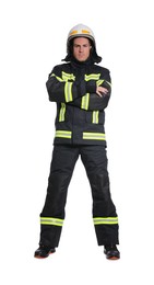 Full length portrait of firefighter in uniform and helmet on white background