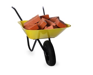 Photo of Pile of red bricks in wheelbarrow on white background. Building material