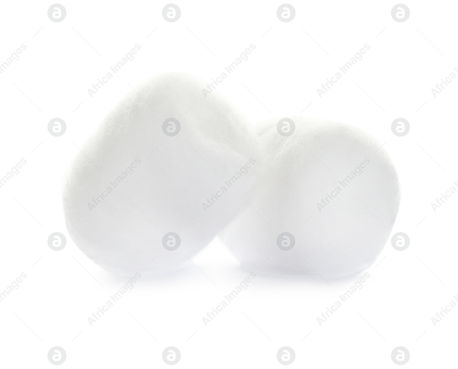 Photo of Balls of fluffy cotton on white background