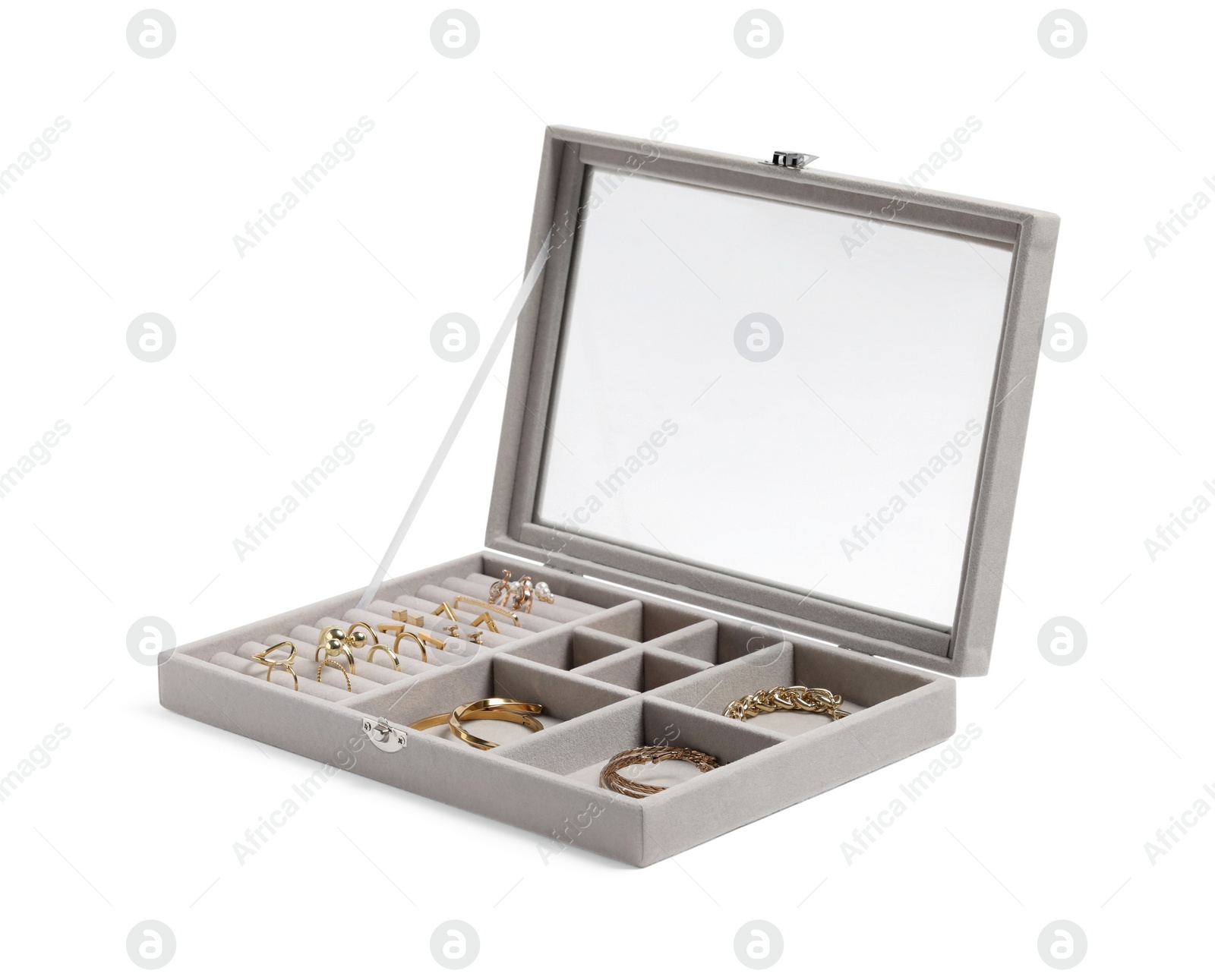 Photo of Jewelry box with many different golden accessories isolated on white