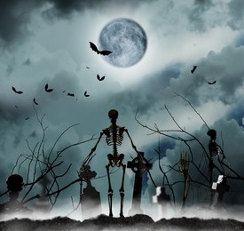 Image of Scary skeletons at misty cemetery in night