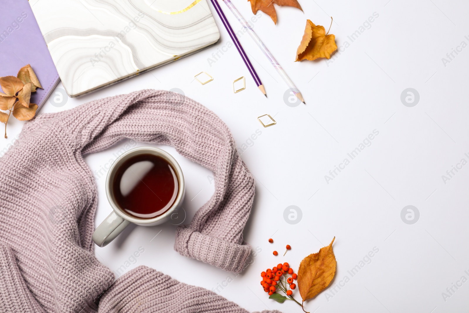 Photo of Composition with cup of hot drink on white background, top view. Cozy autumn atmosphere