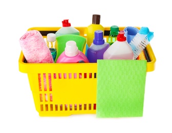 Yellow shopping basket with different household chemicals on white background