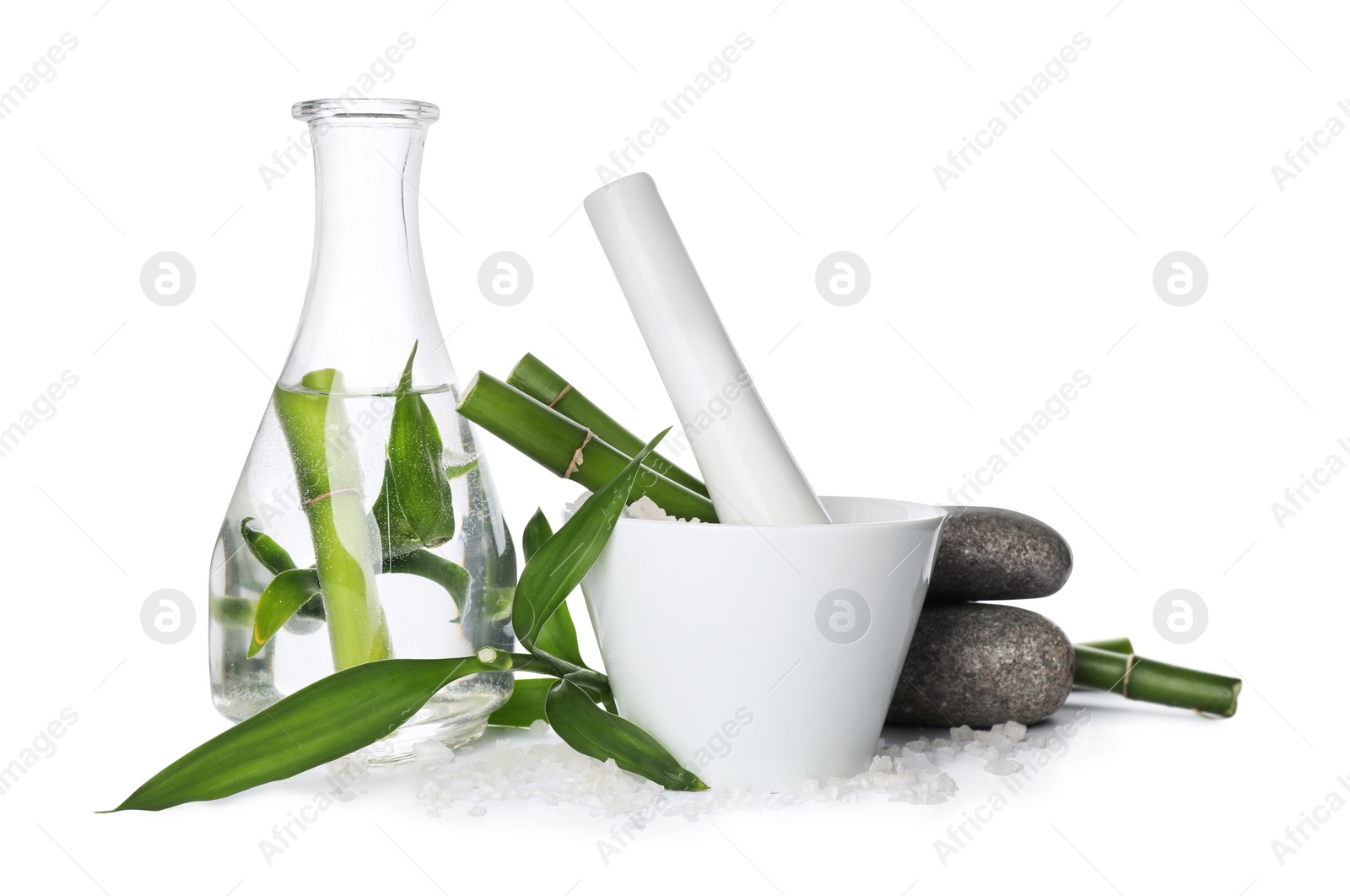 Photo of Composition with fresh bamboo, bath salt and spa stones on white background