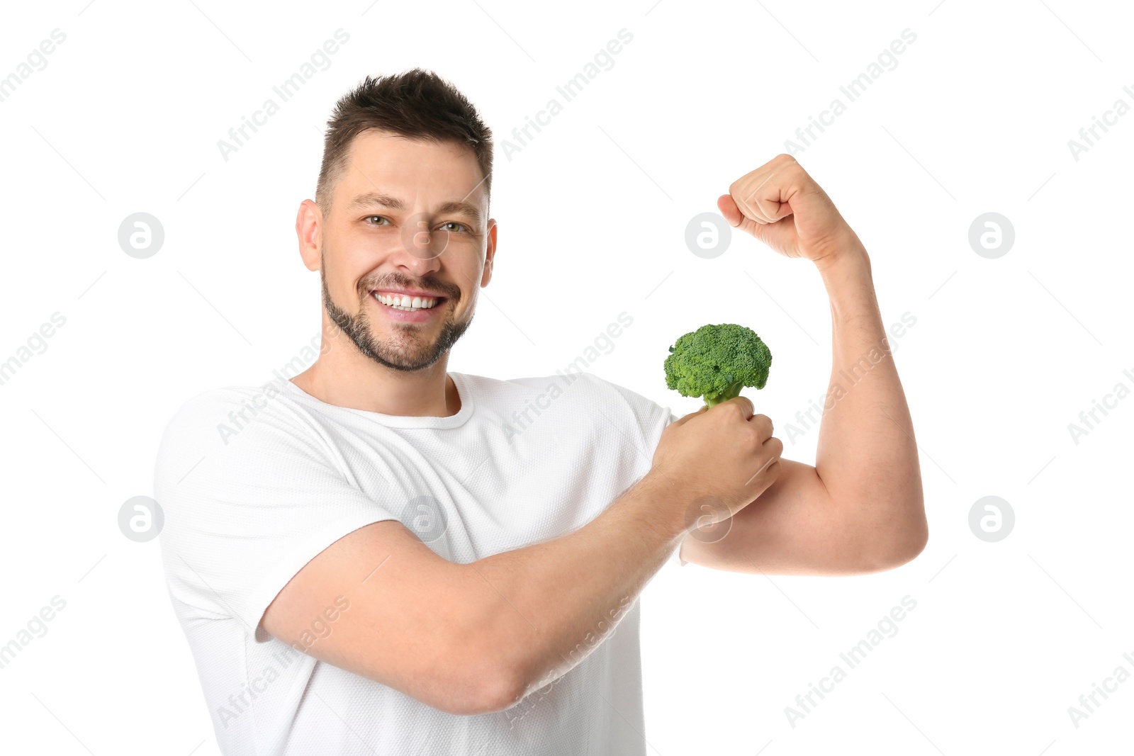 Photo of Portrait of happy man with broccoli on white background