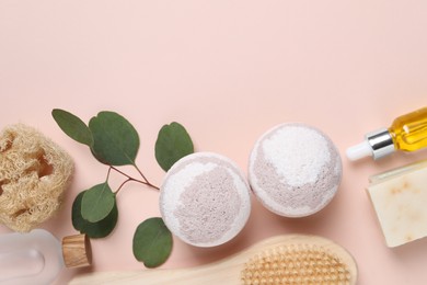 Photo of Flat lay composition with bath bombs on beige background, space for text