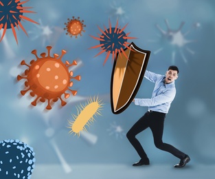 Image of Be healthy - boost your immunity. Man blocking viruses and bacteria with shields, illustration