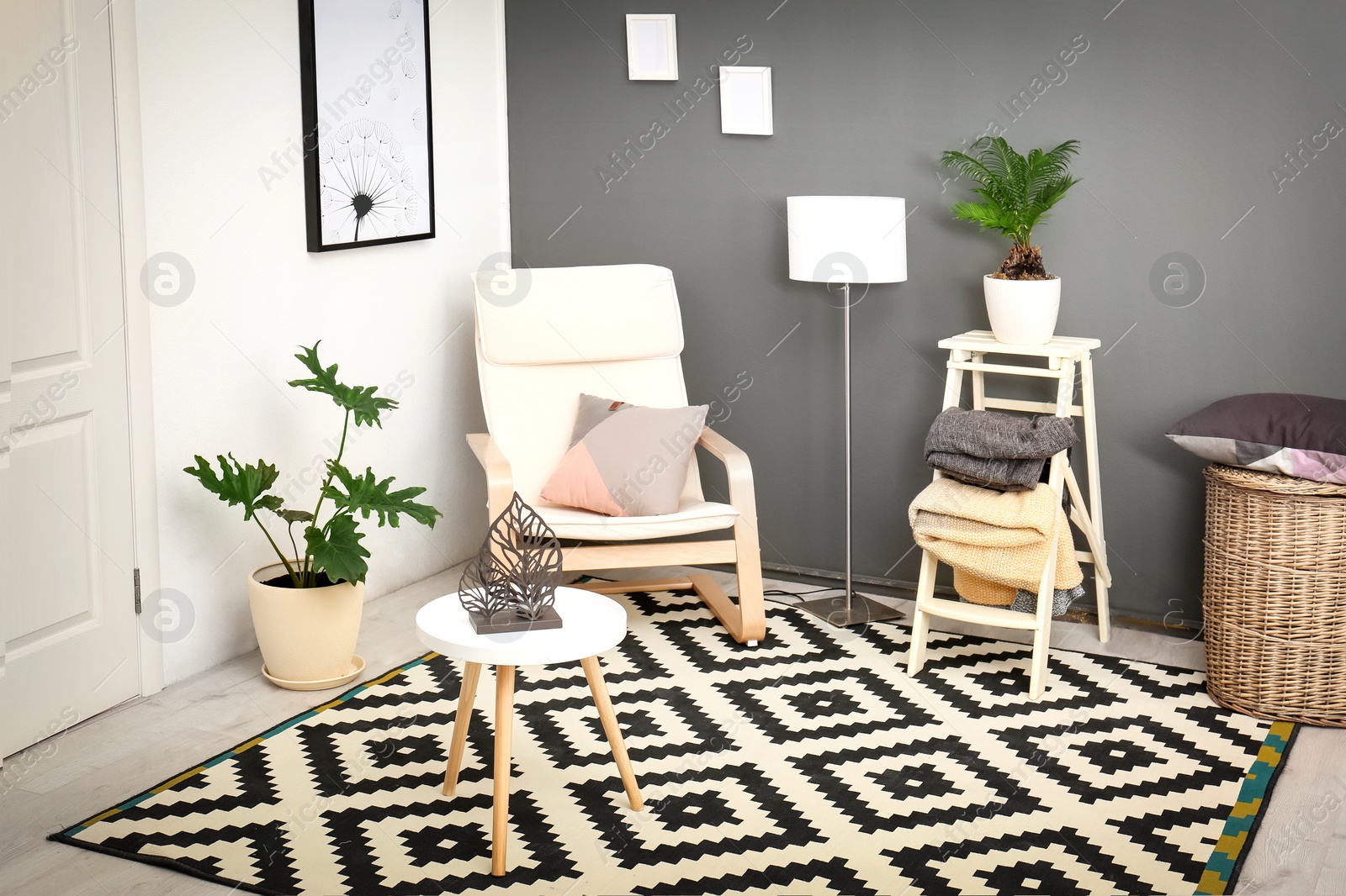 Photo of Stylish interior design with tropical leaves