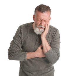 Mature man having heart attack on white background