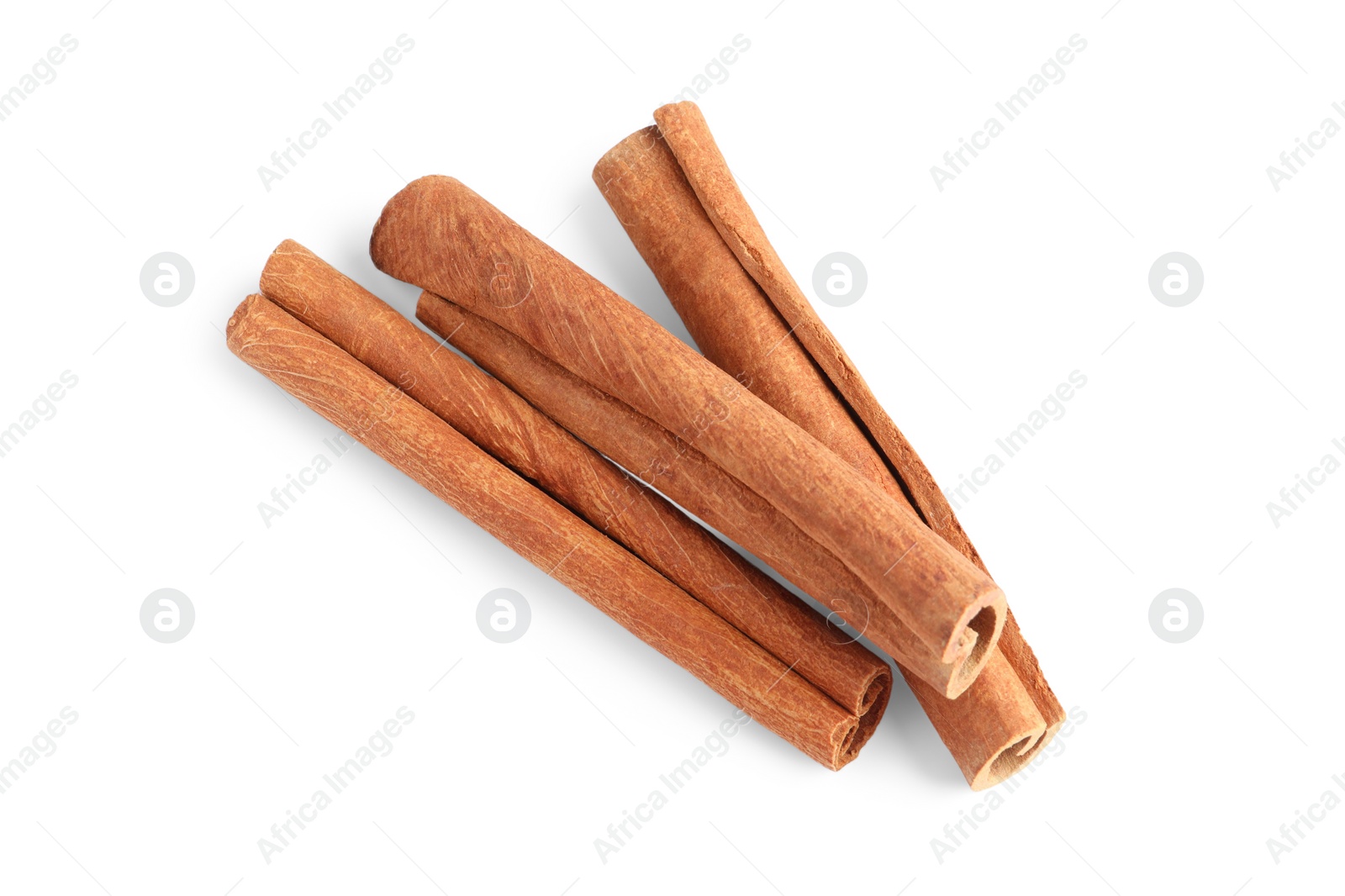 Photo of Cinnamon sticks isolated on white, above view