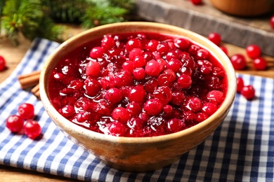 Fresh cranberry sauce served in bowl, closeup