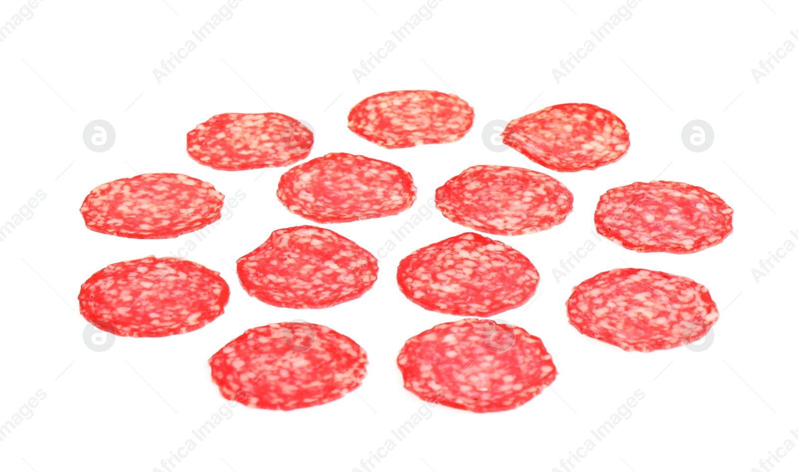 Photo of Slices of tasty salami sausage isolated on white. Layer for pizza