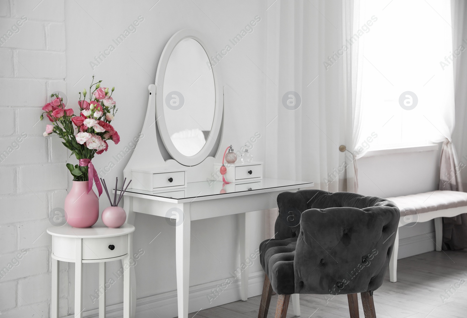 Photo of Stylish room interior with white dressing table