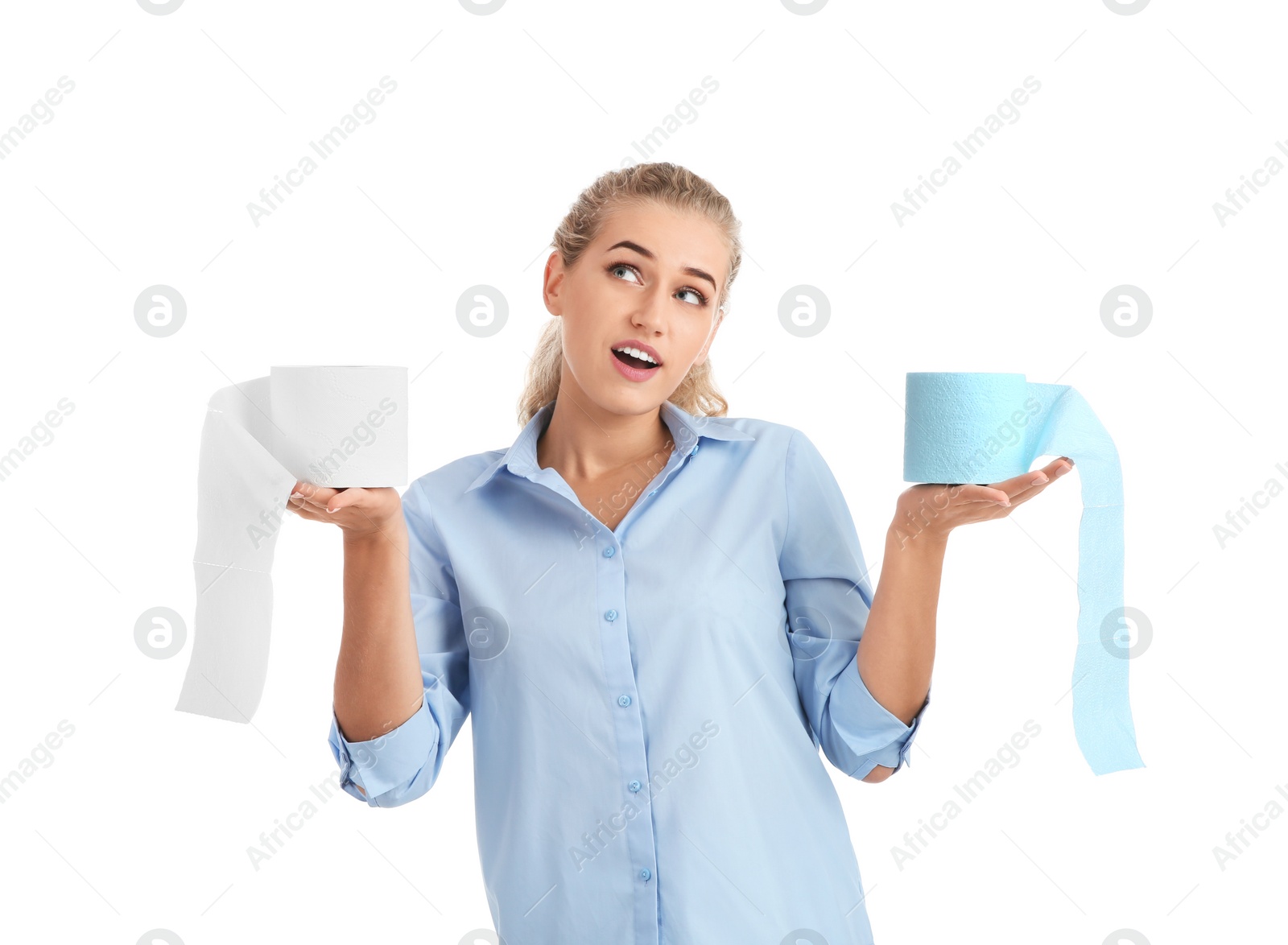 Photo of Beautiful young woman holding toilet paper rolls on white background