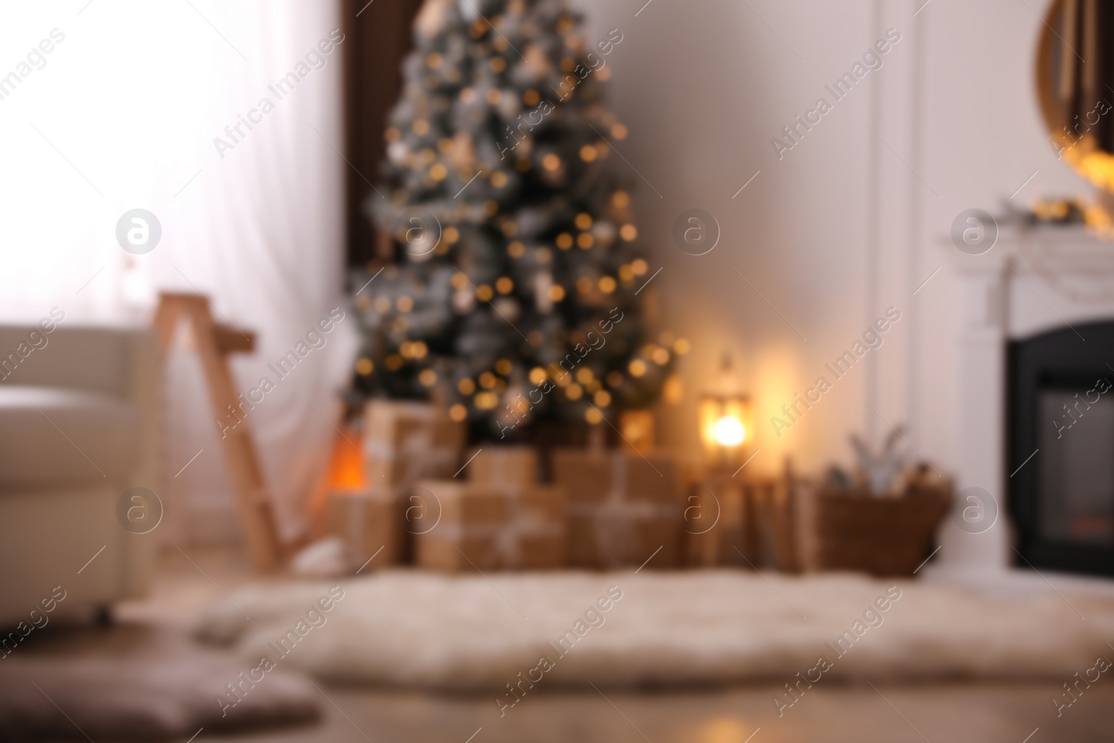 Photo of Blurred view of beautiful room interior with Christmas tree