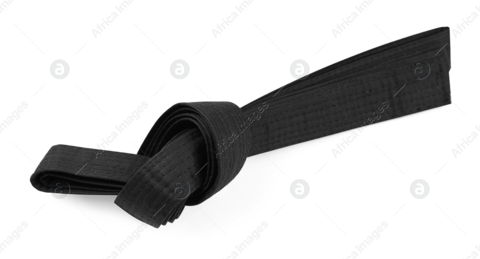 Photo of Black karate belt isolated on white. Martial arts uniform