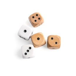 Photo of Many dices isolated on white, top view