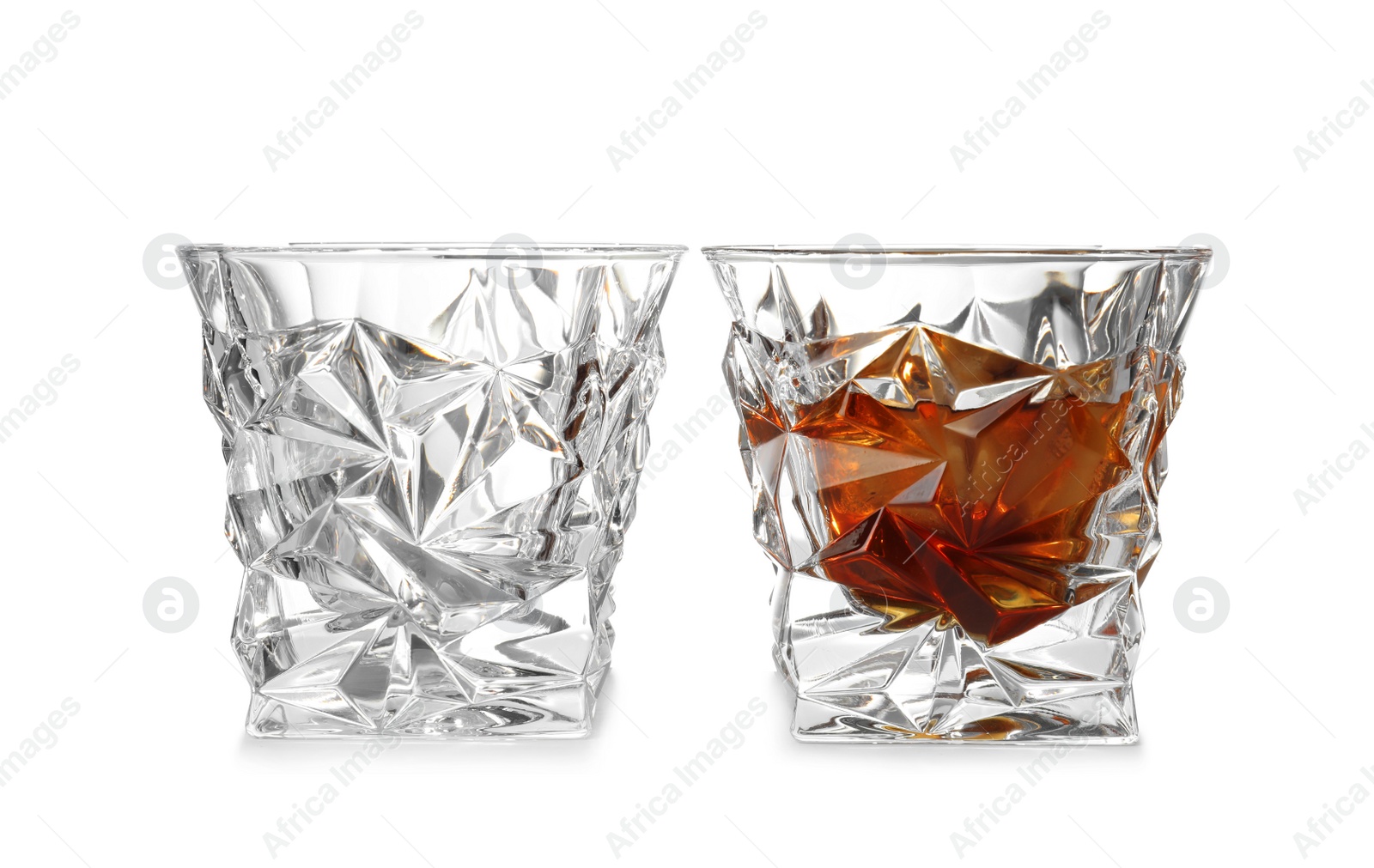 Photo of Empty and full whiskey glasses on white background