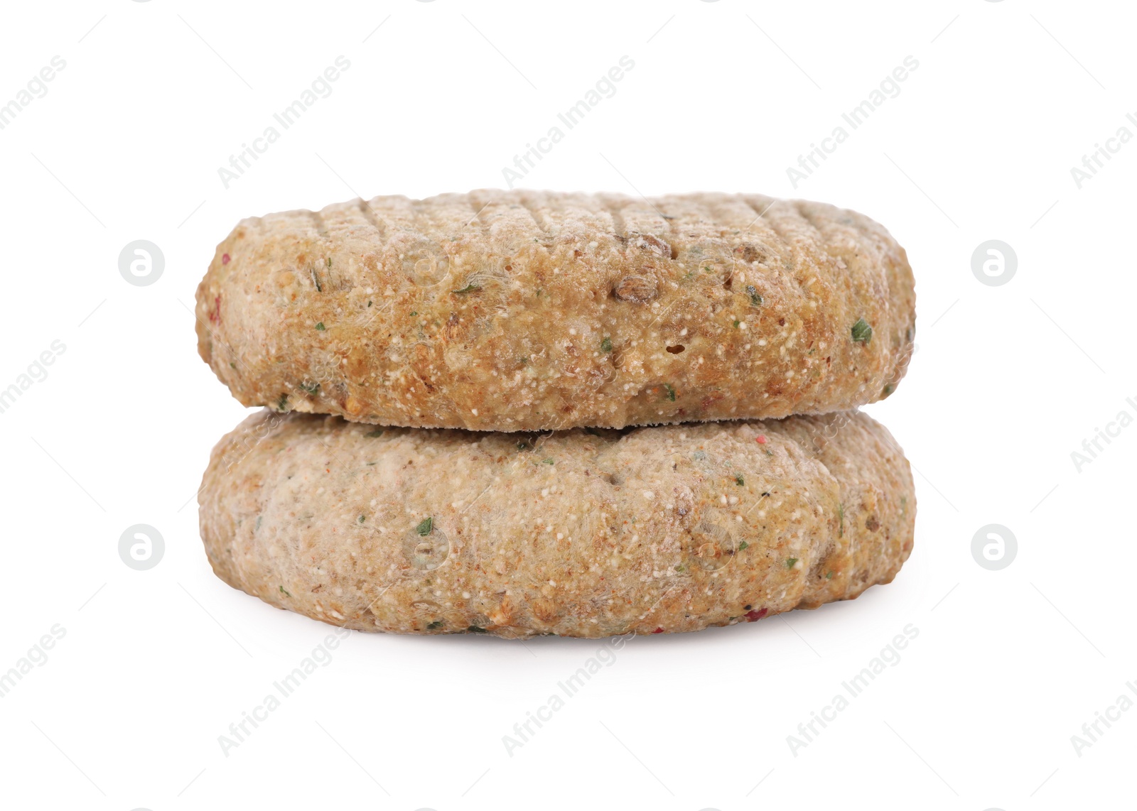 Photo of Raw vegan cutlets with breadcrumbs isolated on white