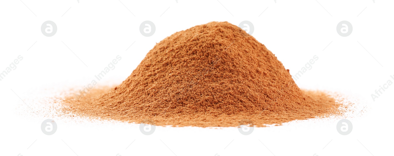 Photo of Pile of dry aromatic cinnamon powder isolated on white