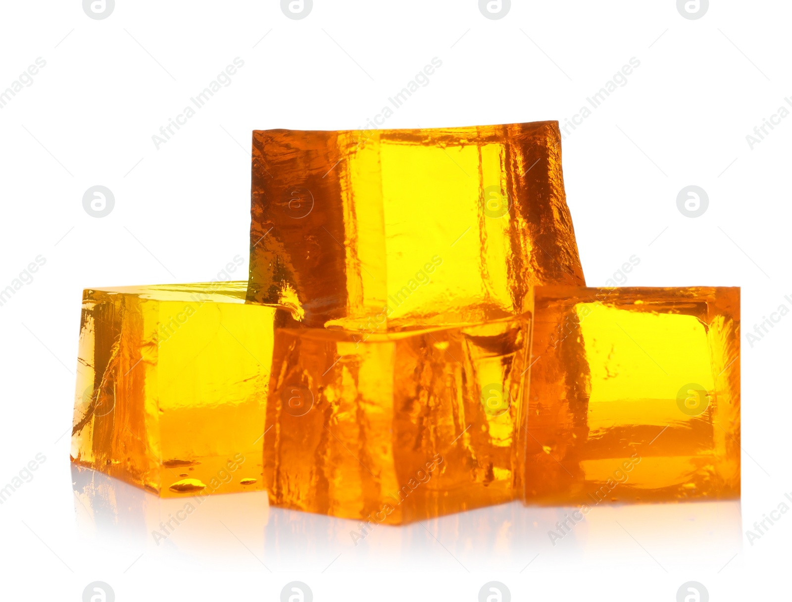 Photo of Pile of tasty jelly cubes isolated on white