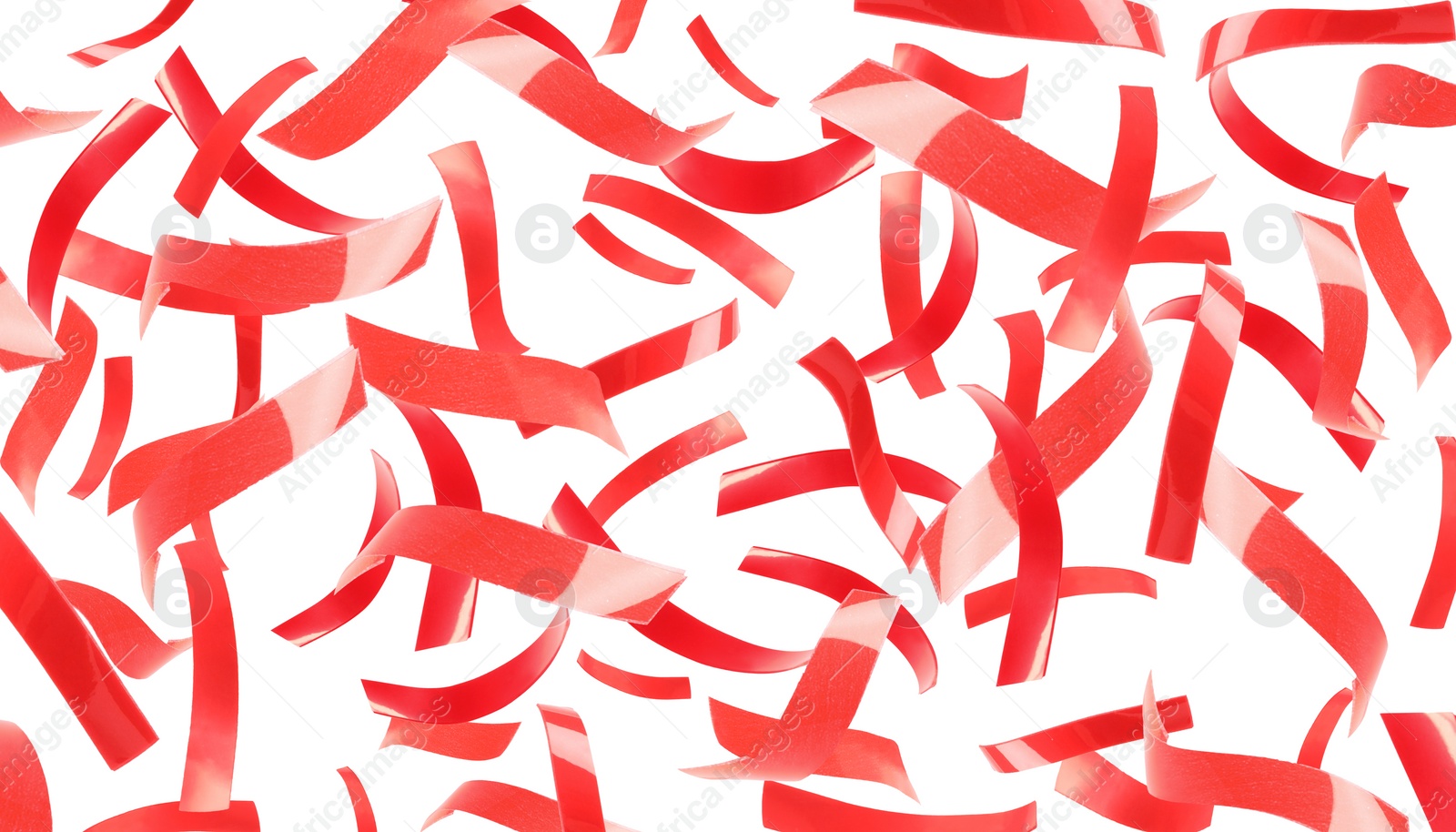 Image of Bright red confetti falling on white background