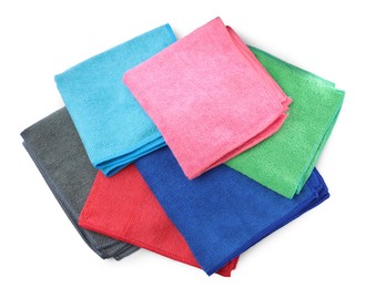 Photo of Colorful microfiber cloths on white background, top view