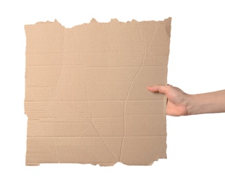 Photo of Woman holding piece of cardboard on white background, closeup. Space for text