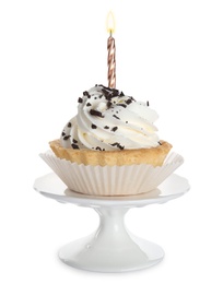 Delicious birthday cupcake with candle on white background