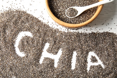 Photo of Flat lay composition with chia seeds on white wooden background