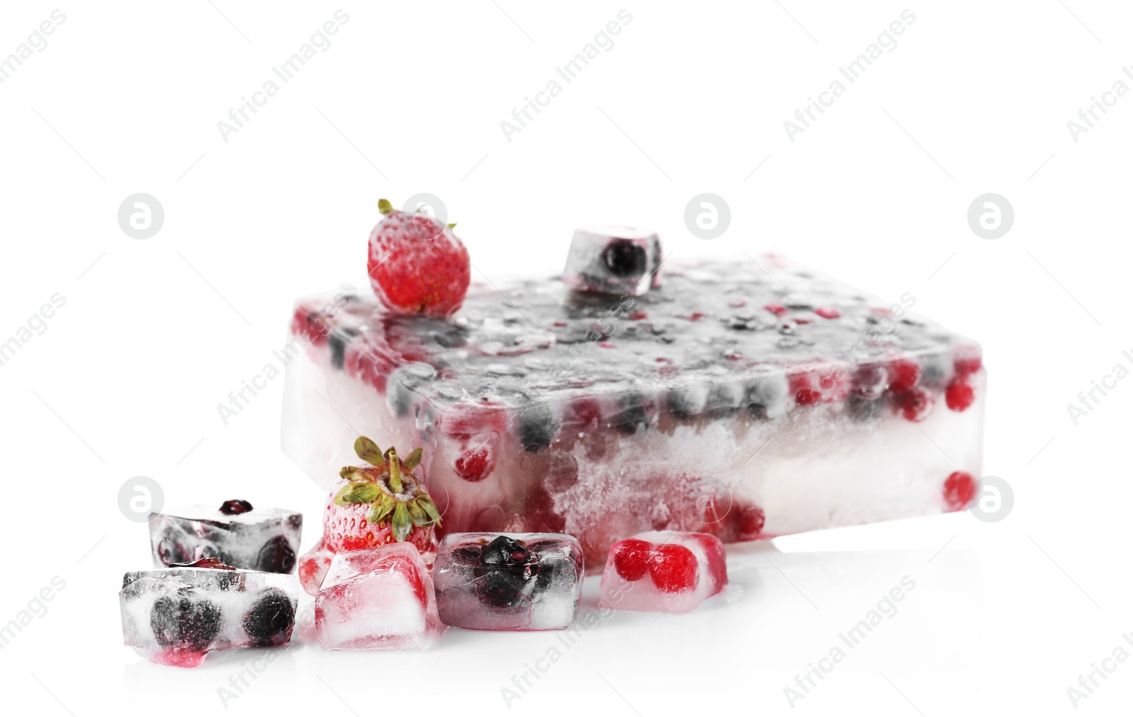 Photo of Fresh berries frozen in ice cubes on white background