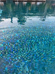 Photo of Clear refreshing water in outdoor swimming pool