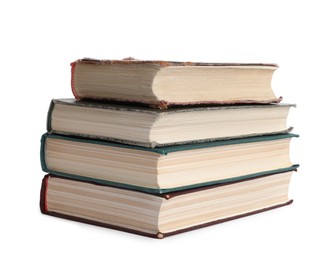 Stack of many old hardcover books isolated on white