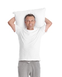 Photo of Man holding soft pillow on white background