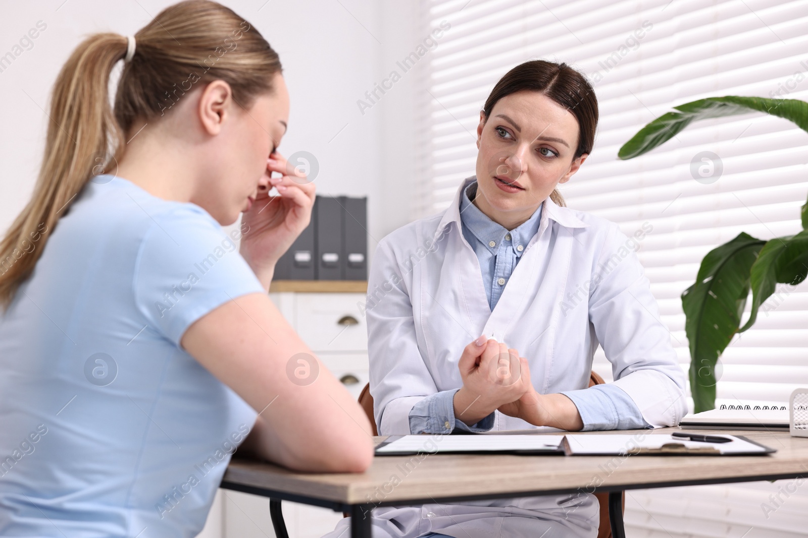 Photo of Mammologist's appointment. Doctor and woman in hospital