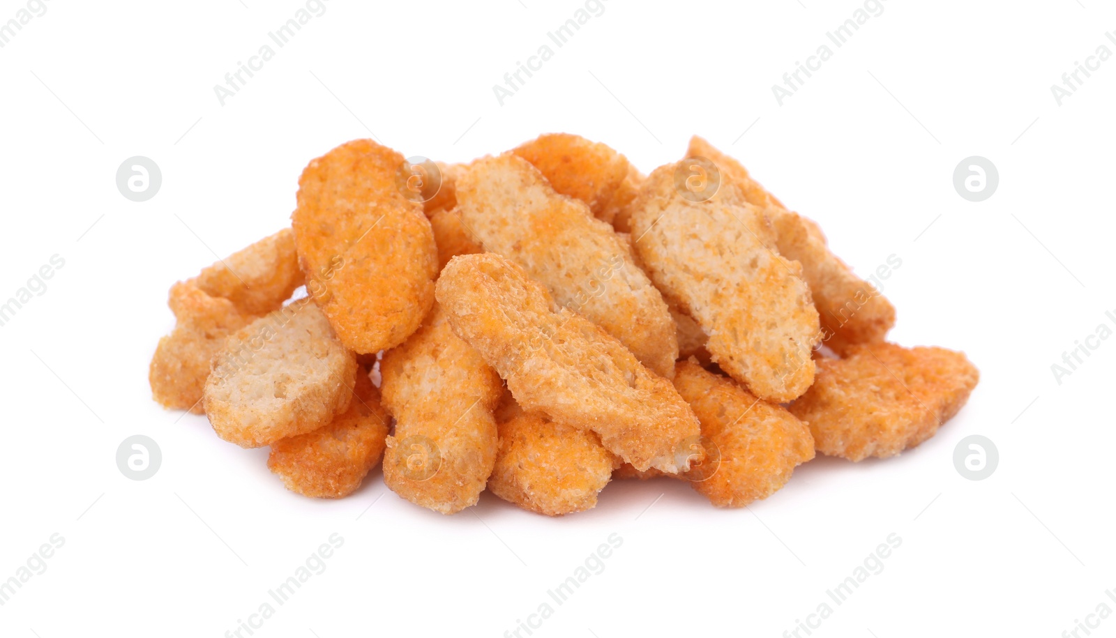 Photo of Pile of delicious crispy rusks on white background