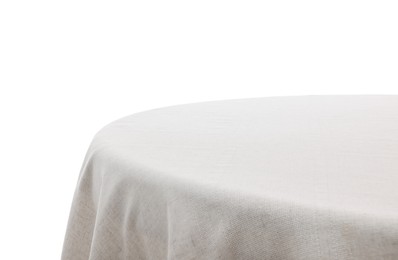 Table with light tablecloth isolated on white