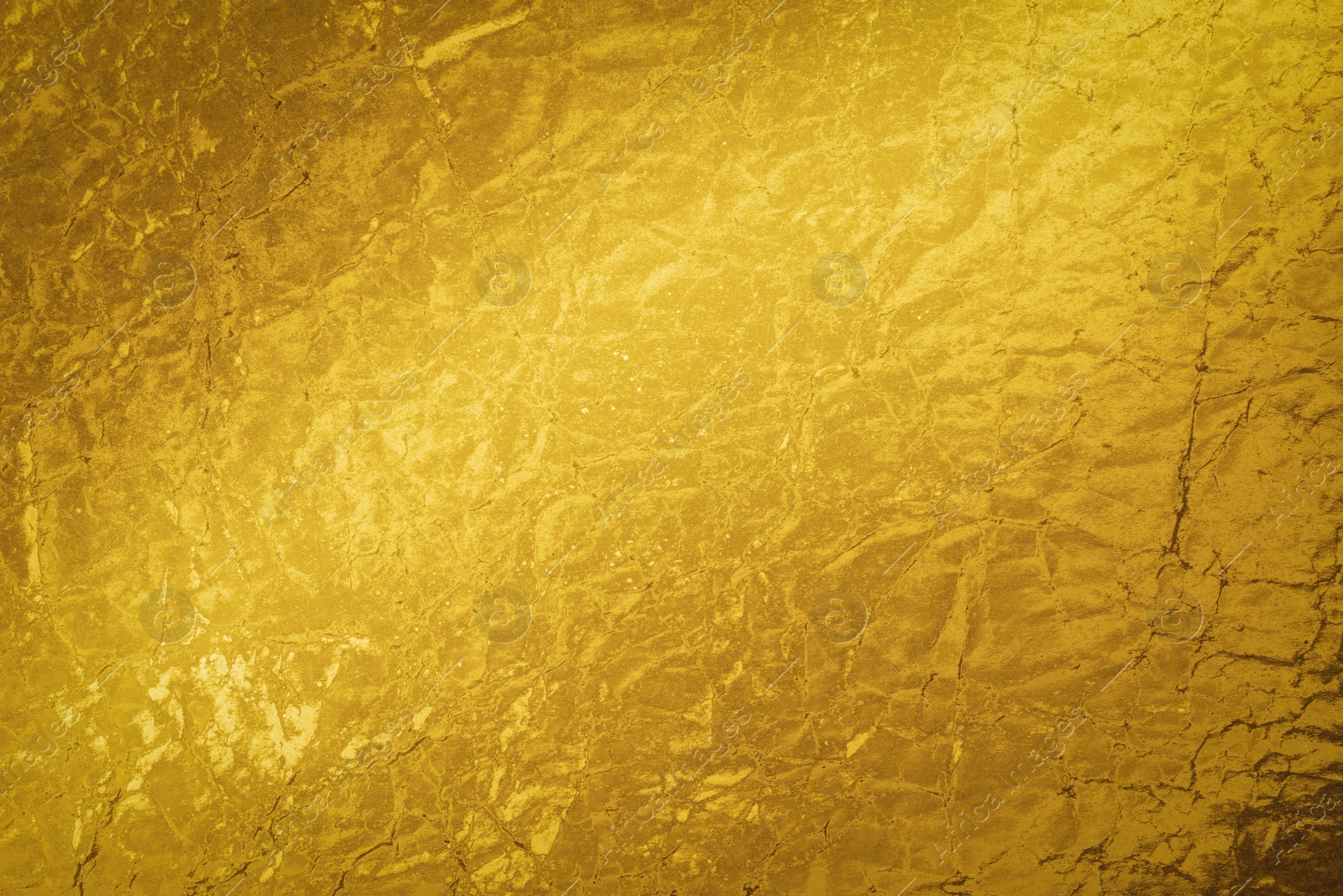 Image of Golden textured surface as background, closeup view