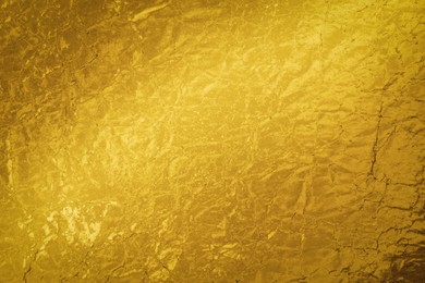 Image of Golden textured surface as background, closeup view