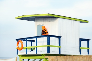 Photo of Lifeguard tower with rescue equipment on beach