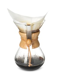 Photo of Glass chemex coffeemaker with paper filter and coffee isolated on white